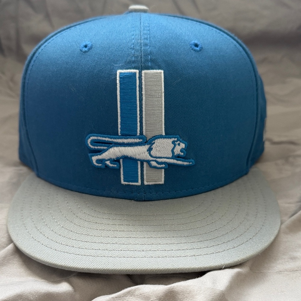 New Era Blue and Gray Cap with Lion Logo